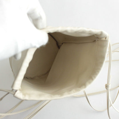 LEATHER BIG ROUND STRING POUCH #IVORY [A23AB01AE]