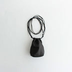 LEATHER BIG ROUND STRING POUCH #BLACK [A23AB01AE]